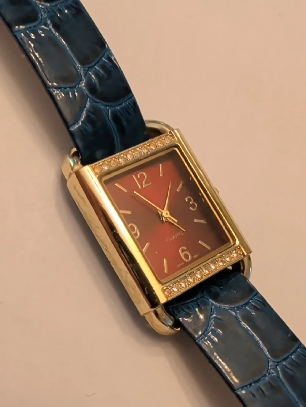 Vintage Blue Strap Gold-Tone Rectangular Watch with Red Dial
